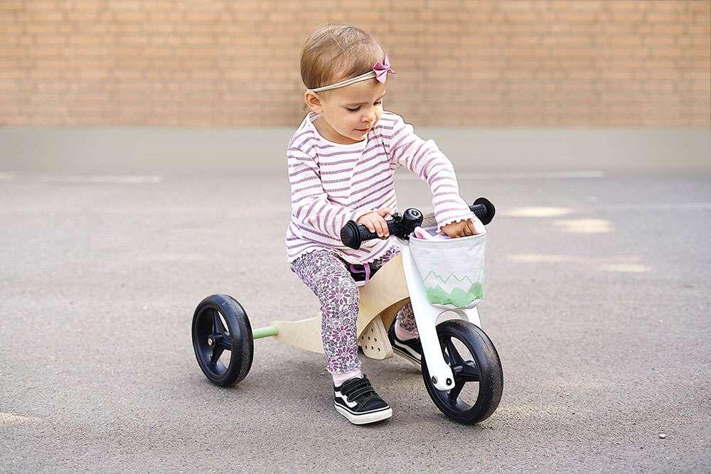 Draisienne et tricycle vert sauge
