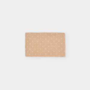 Tour de coup beige à pois
